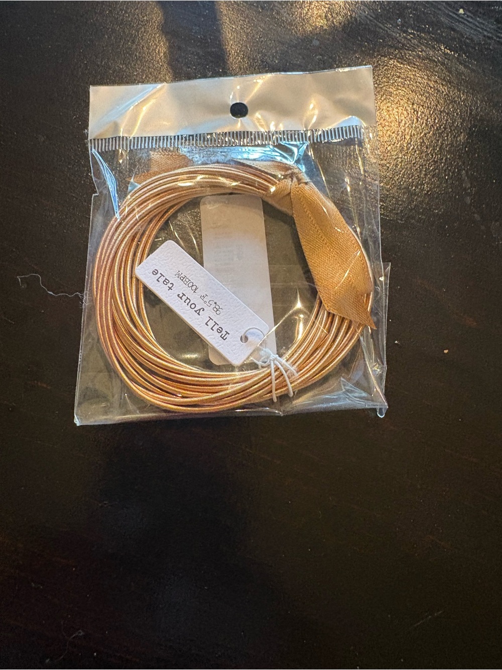 GUITAR STRING BRACELETS IN GOLD TONE